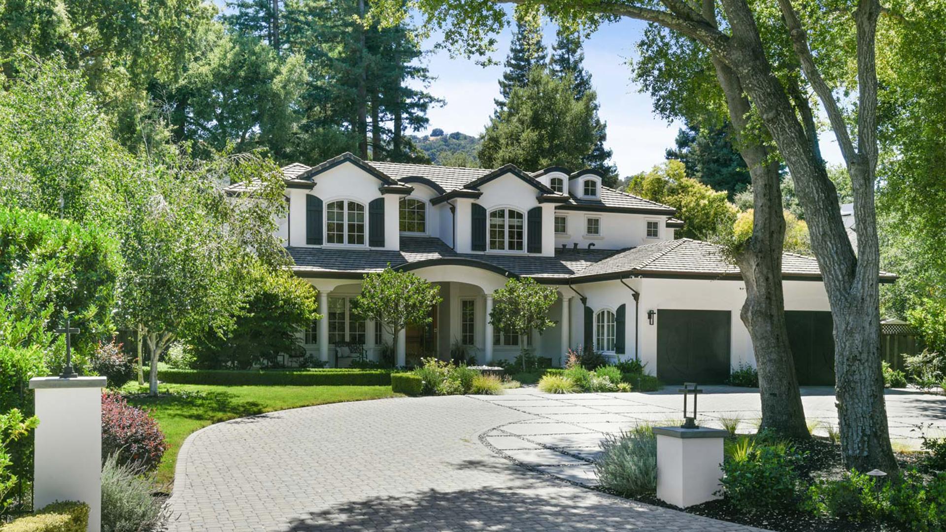 Exterior of home surrounded by trees