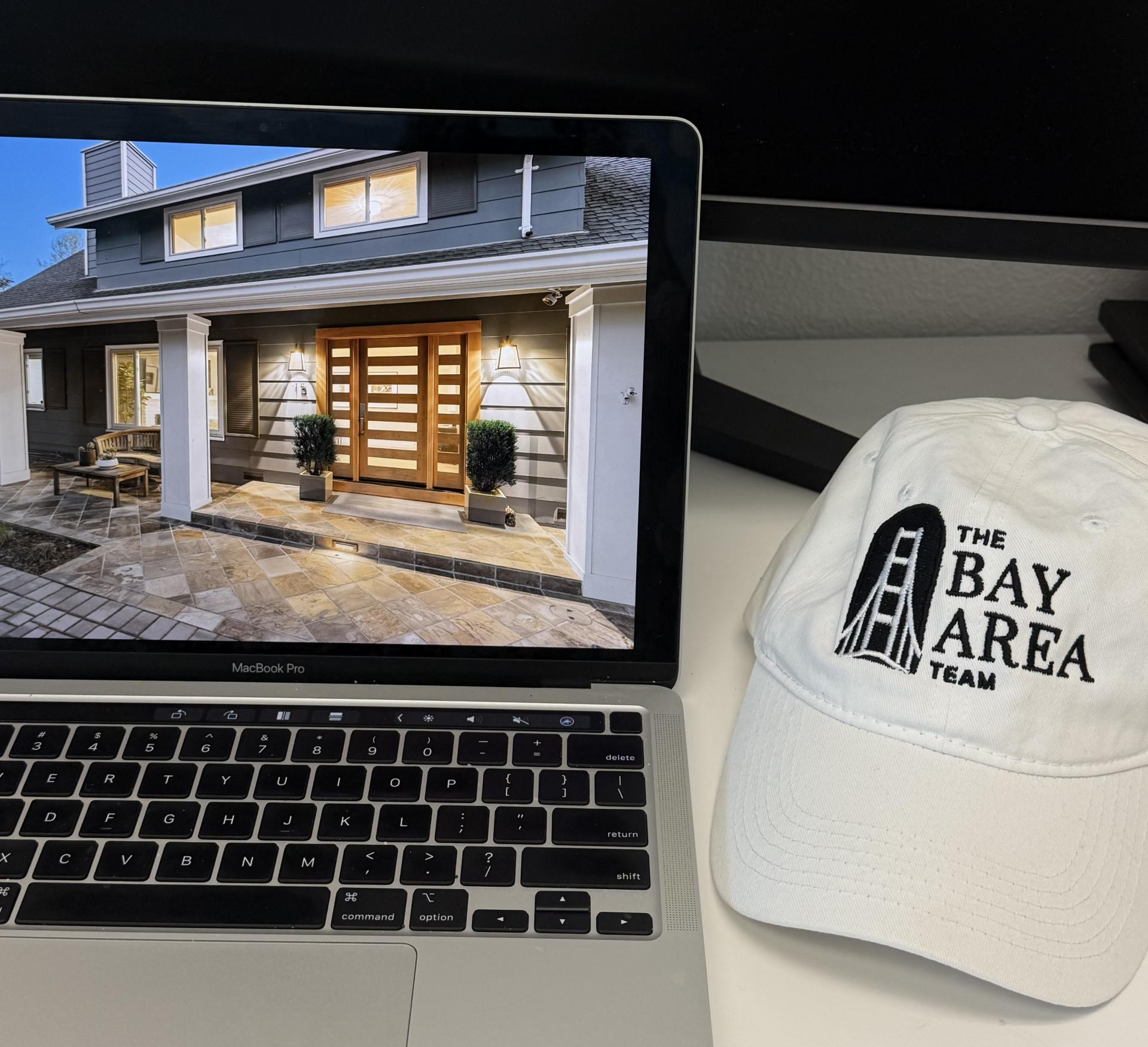 Laptop displaying a property listing with The Bay Area Team hat, representing AI and real estate decision-making in Danville California
